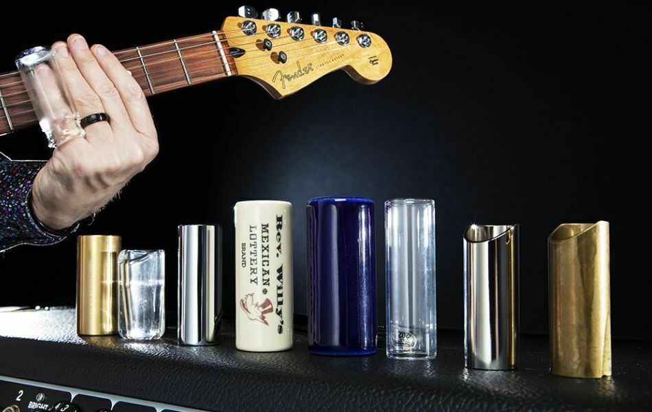 Guitar slide is made from ceramic, glass and metal